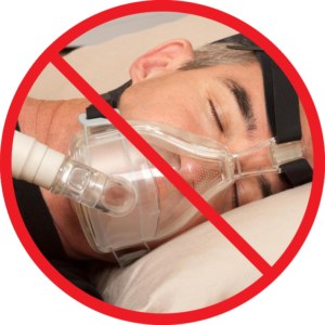 Man wearing CPAP with a stop sign on it